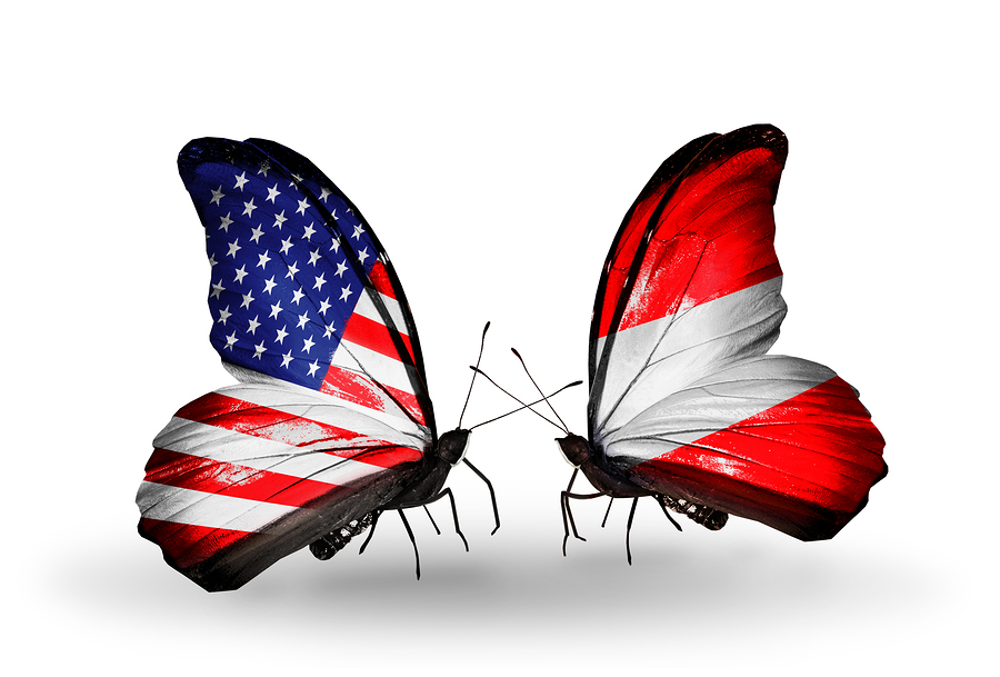 Two butterflies with flags on wings as symbol of relations USA and Austria