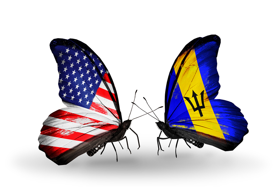 Two butterflies with flags on wings as symbol of relations USA and Barbados