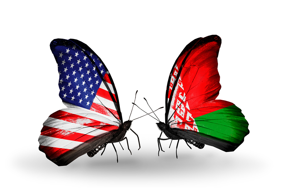 Two butterflies with flags on wings as symbol of relations USA and Belarus