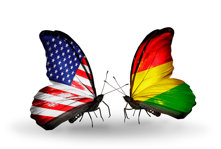 Two butterflies with flags on wings as symbol of relations USA and Bolivia