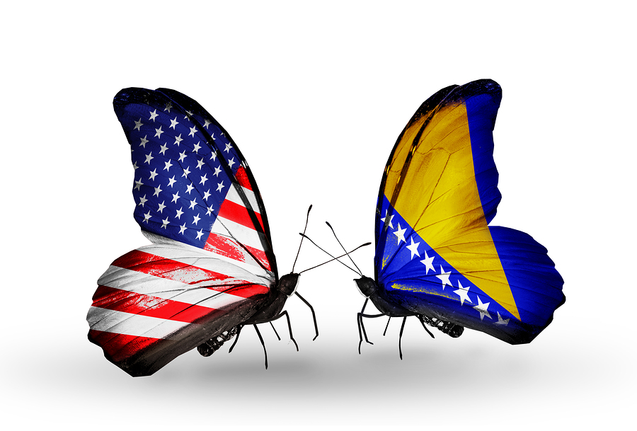 Two butterflies with flags on wings as symbol of relations USA and Bosnia and Herzegovina