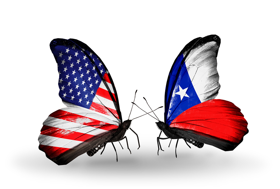 Two butterflies with flags on wings as symbol of relations USA and Chile