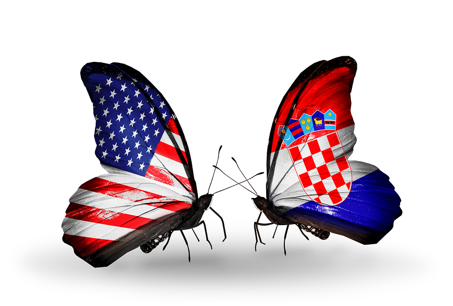 Two butterflies with flags on wings as symbol of relations USA and Croatia
