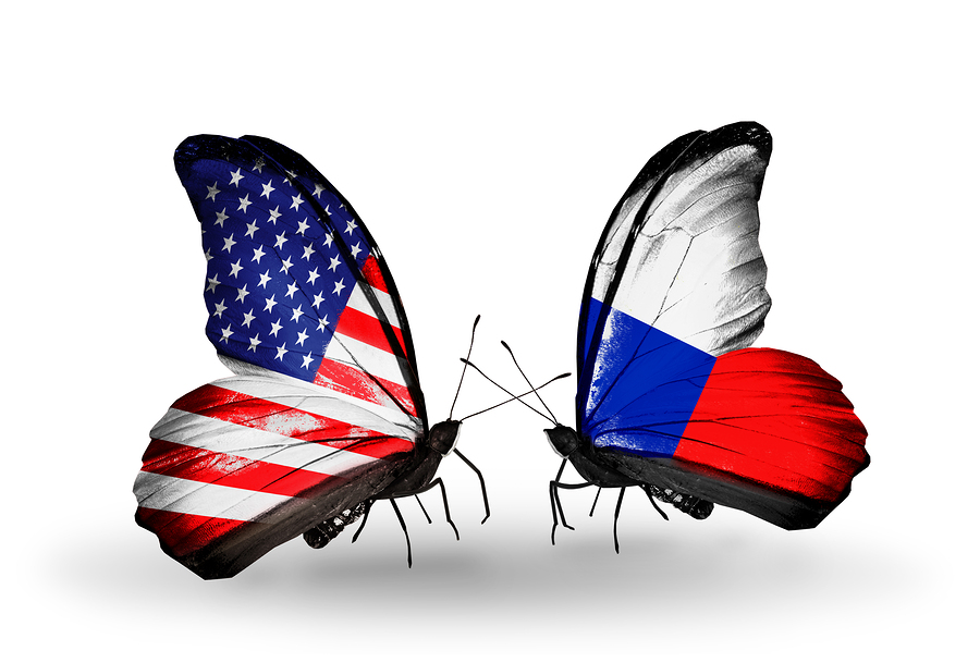 Two butterflies with flags on wings as symbol of relations USA and Czech