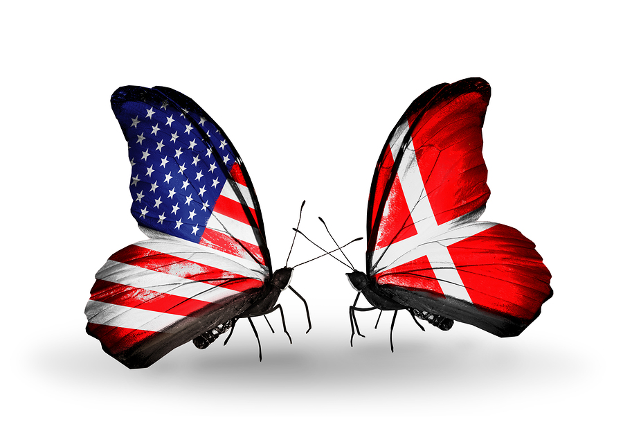 Two butterflies with flags on wings as symbol of relations USA and Denmark