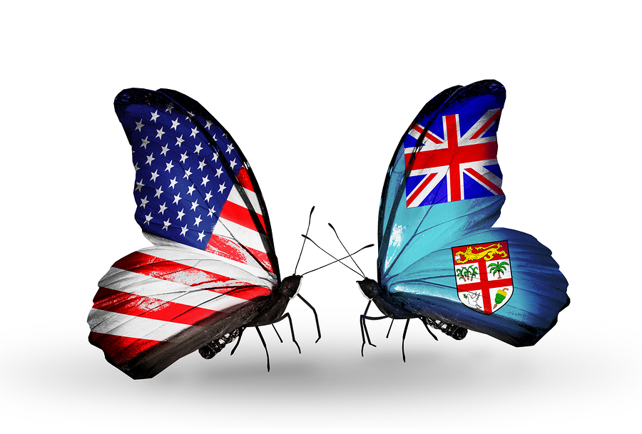 Two butterflies with flags on wings as symbol of relations USA and Fiji