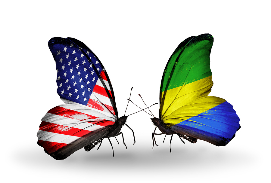 Two butterflies with flags on wings as symbol of relations USA and Gabon