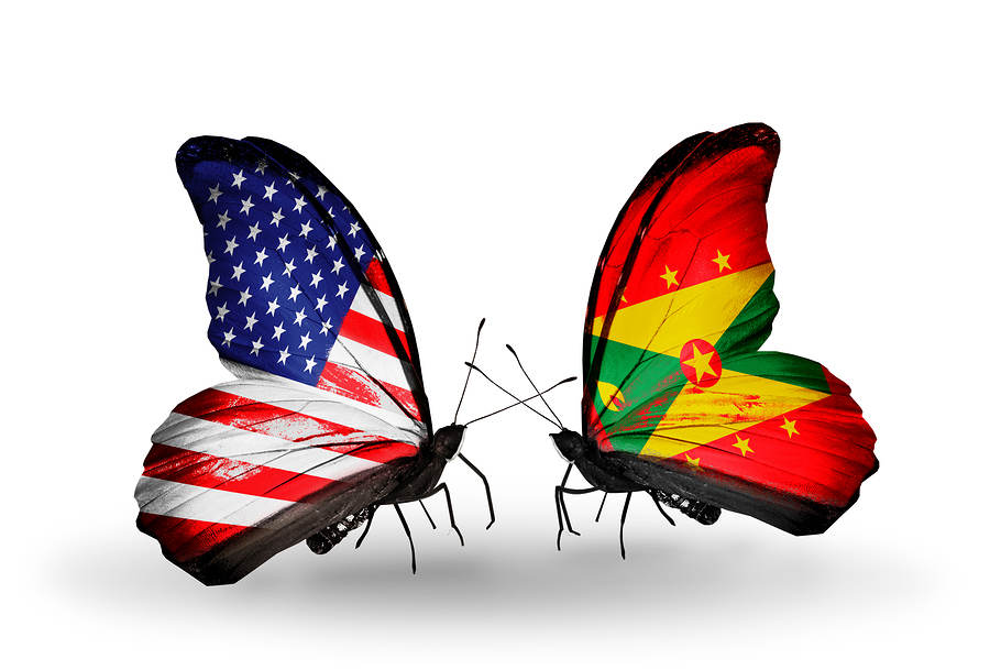 Two butterflies with flags on wings as symbol of relations USA and Grenada