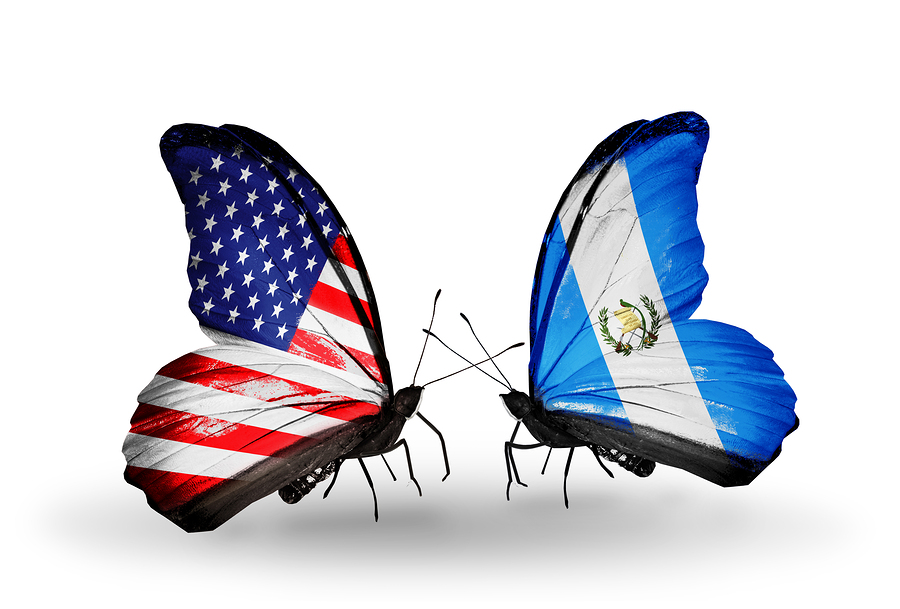 Two butterflies with flags on wings as symbol of relations USA and Guatemala