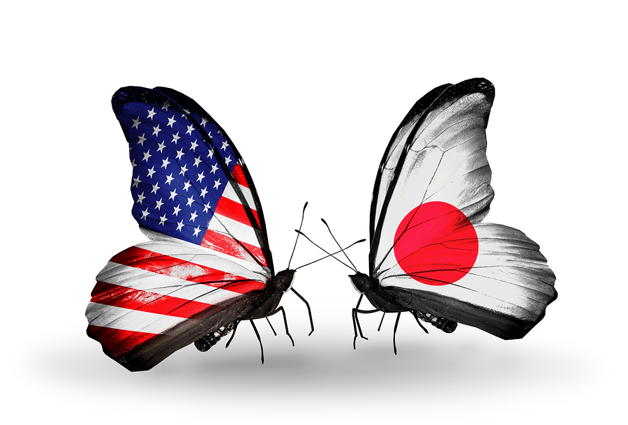 Two butterflies with flags on wings as symbol of relations USA and Japan