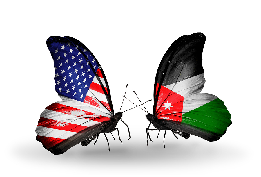 Two butterflies with flags on wings as symbol of relations USA and Jordan