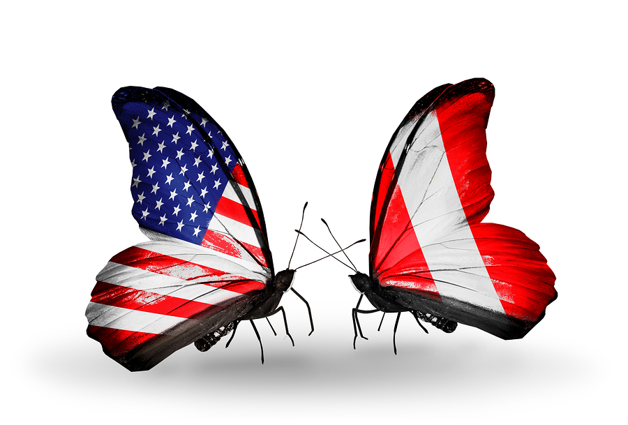 Two butterflies with flags on wings as symbol of relations USA and Peru