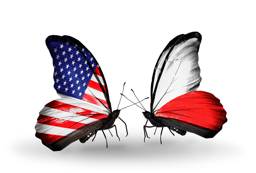 Two butterflies with flags on wings as symbol of relations USA and Poland