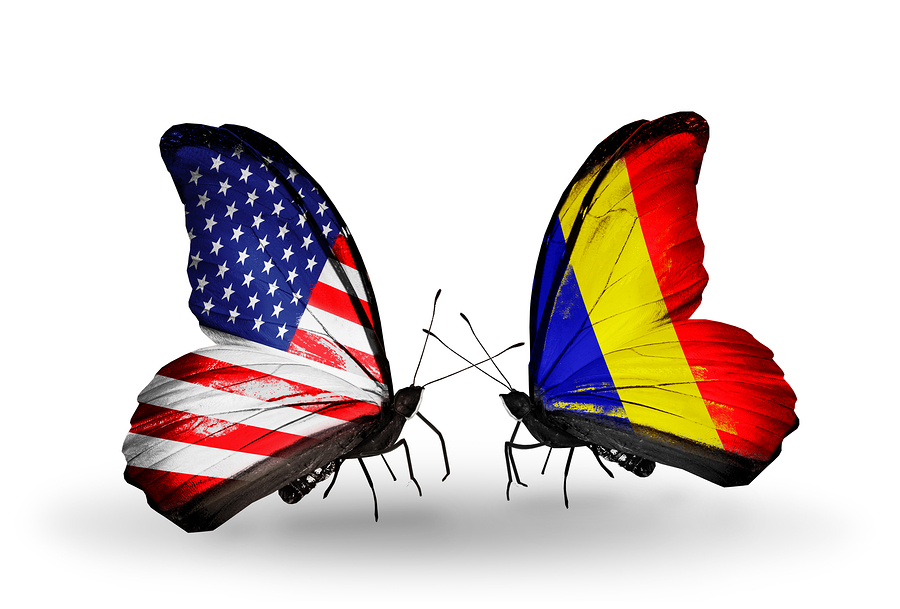 Two butterflies with flags on wings as symbol of relations USA and Chad Romania