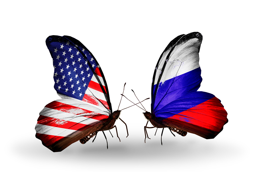 Two butterflies with flags on wings as symbol of relations USA and Russia