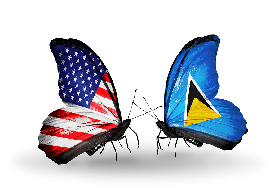 Two butterflies with flags on wings as symbol of relations USA and Saint Lucia
