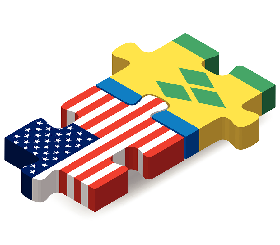 Vector Image - USA and Saint Vincent and the Grenadines Flags in puzzle isolated on white background.