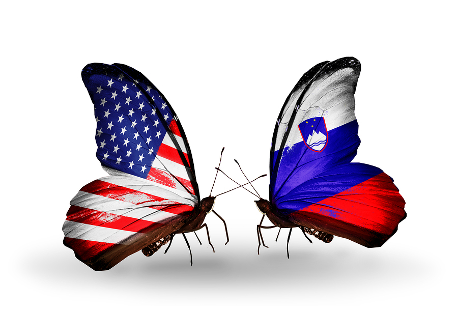 Two butterflies with flags on wings as symbol of relations USA and Slovenia