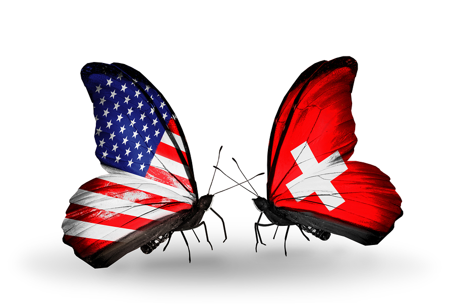 Two butterflies with flags on wings as symbol of relations USA and Switzerland