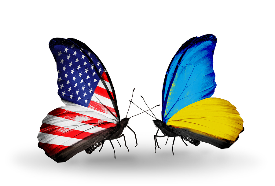 Two butterflies with flags on wings as symbol of relations USA and Ukraine
