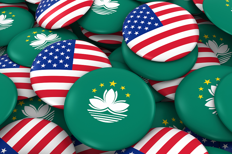Usa And Macau Badges Background Pile Of American And Macanese USA and Macau Badges Background - Pile of American and Macanese Flag Buttons 3D Illustration