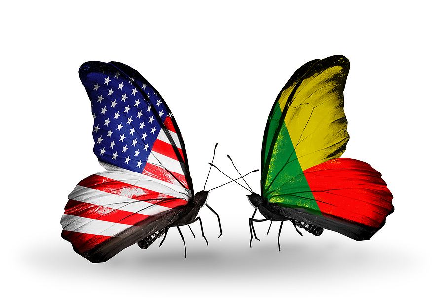 Two butterflies with flags on wings as symbol of relations USA and Benin